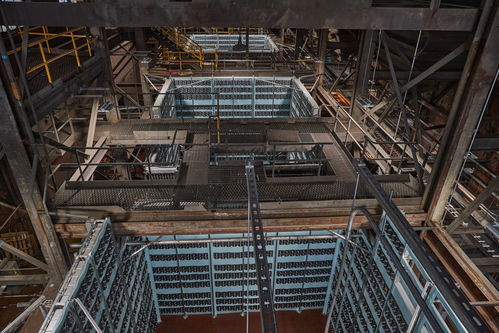 An array of advanced mining rigs in a professional USA hosting facility, designed for optimal Bitcoin and altcoin extraction
